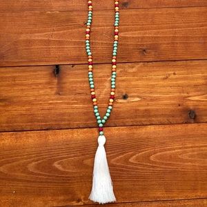 Beaded by W tassel necklace